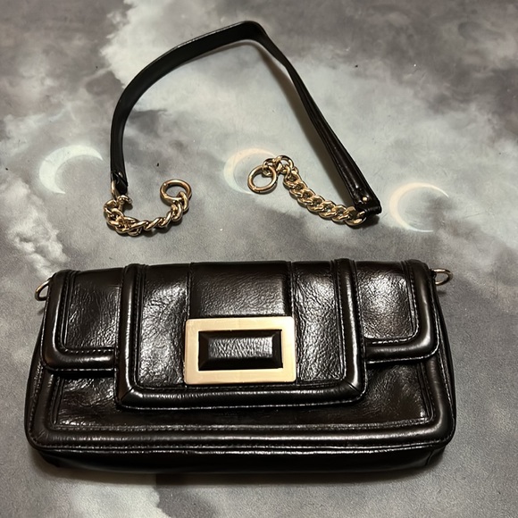 Sleek black faux leather Banana Republic purse with gold accents. - Picture 4 of 4